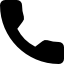 Black icon of a classic telephone handset, displayed at an angle on a white background.